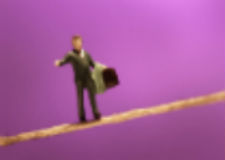 how to sell more - man on tightrope